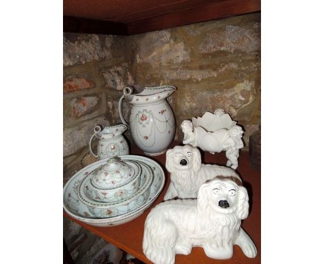 A pair of 19th century Staffordshire white glazed recumbent spaniels together with a collection of Royal Doulton toilet wares