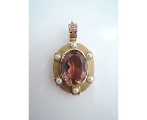 A tourmaline and pearl pendant clasp, centred with an oval mixed-cut untested pink tourmaline weighing approximately 6.08cts,