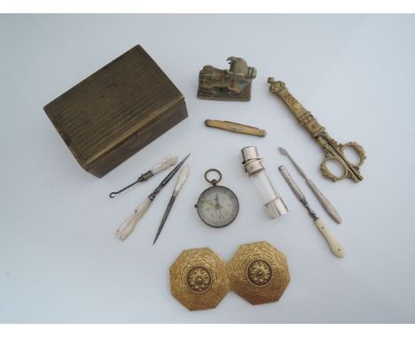A cased set of brass scissors, 19th century vinaigrette in glass and silver plate, 2 sectional embrossed brass buckles, compa