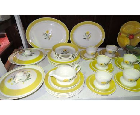 A quantity of Susie Cooper Marigold pattern dinner and tea wares number 2386 comprising two oval graduated meat plates, a pai