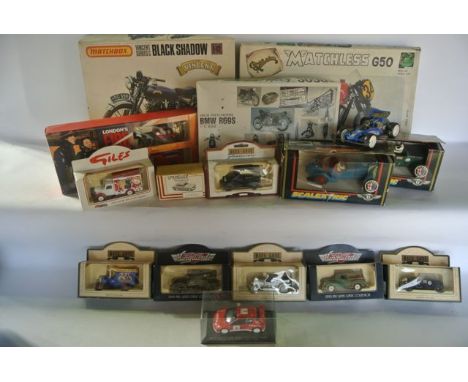 A selection of boxed die cast model vehicles to include examples from the Days Gone and Vanguards ranges, others by Scalextri