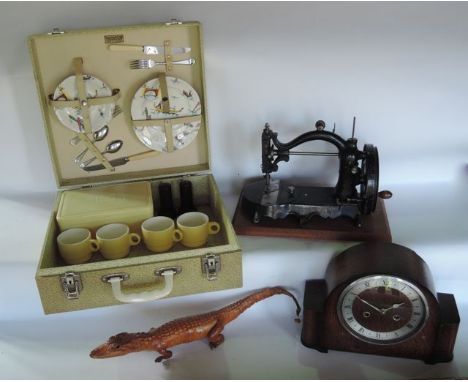 A vintage cased picnic set by Brexton with a fitted interior containing four side plates and four saucers with brightly colou