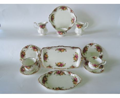 A collection of Royal Albert Old Country Roses pattern tea wares comprising three milk jugs, a sugar bowl, pair of cake plate