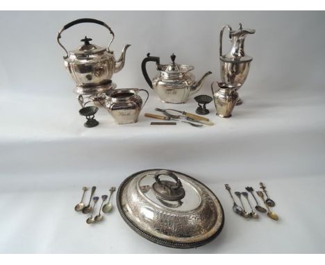 A selection of plated wares to include a kettle on associated stand/burner, teapot, two handled sugar basin and milk jug, all