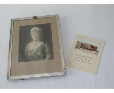A silver easel back picture frame, London, 1936, of plain rectangular form, mounted at the top with a crown motif, 33cm high,