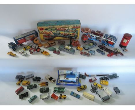 A selection of vintage model vehicles to include a boxed Corgi car transporter and six cars to include the Corgi Rover 2000, 