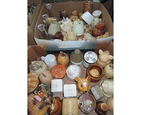 An extensive  collection of various ceramic honey pots in different designs, including bears, bee skeps, etc, also together w