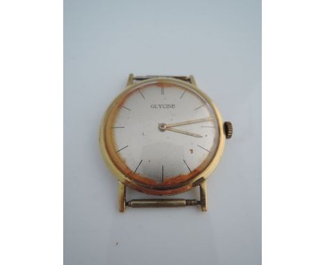 A gentleman's 18ct gold wristwatch, Glycine, the circular silvered dial with black baton numerals, strap lacking