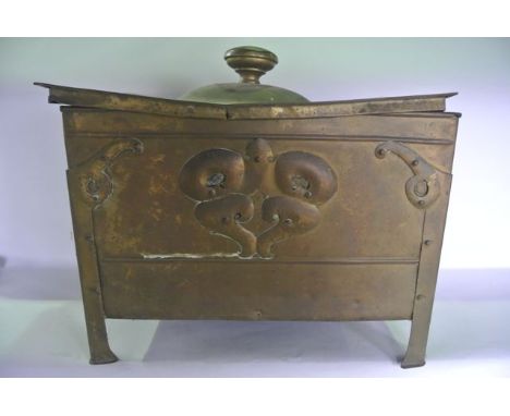 A late 19th/early 20th century coal chest of rectangular form with applied and pierced motif in the Arts & Crafts style, flan
