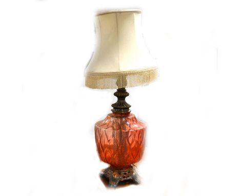 Table lamp, large moulded and tinted glass body, metal mounts, with shade, 87cm.