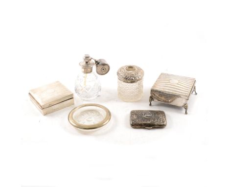 A collection of silver and glass to include two silver engine turned cigarette/jewel boxes, cigarette case, glass perfume ato