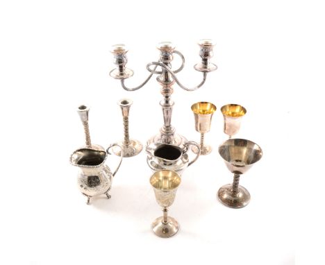 Electroplated three-light candelabra, 28cm; other plated wares; two silver napkin rings