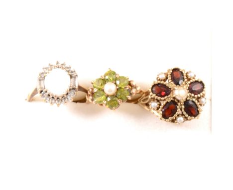 Three vintage gemset dress rings, a 9 carat yellow gold ring set with five oval mixed cut garnets and six small pearls, hallm