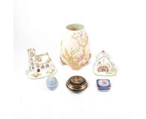 Clarice Cliff, Newport pottery vase, moulded with magnolia, 22cm; five Coalport bone china cottages; and other decorative cer