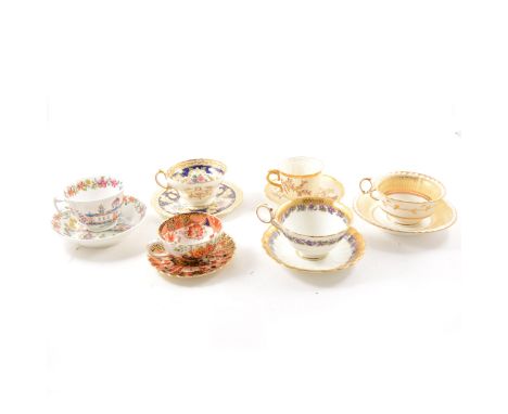 Royal Worcester blush ivory cup and saucer, Cauldon trio and a small collection of other decorative cups and saucers.