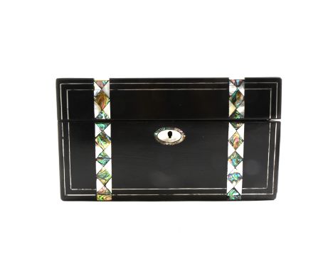 A lady's ebonised travelling box inlaid with mother-of-pearl, red velvet lined, glass jars and bottles some with metal covers