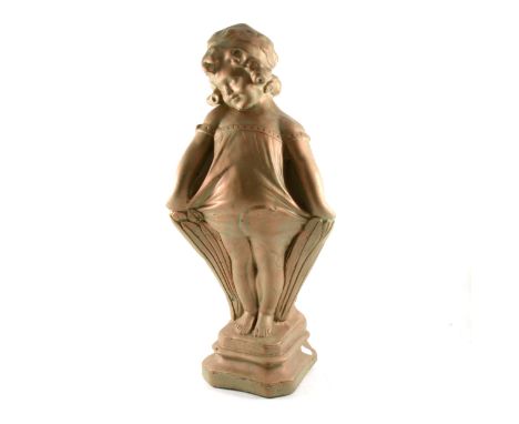 Art Deco style plaster figure of a young girl, bronze painted, 59cm.