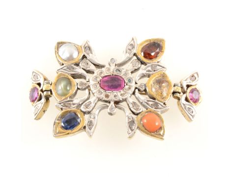 A gem-set Navratna Bazuband, yellow and white metal with hinged section to each side set with rose cut diamonds, coloured gem