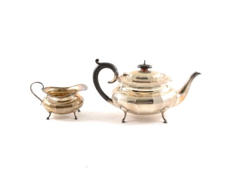 Silver teapot and milk jug, by A Marston &amp; Co, Birmingham 1930, the teapot with ebonised handle and finial, 16cm, 21oz gr