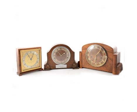 An Elliot walnut cased mantel clock, square dial, 21cm, a walnut cased mantel and an oak cased mantel clock with presentation