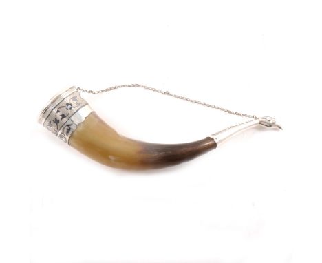 A horn drinking vessel, white metal mounts with niello decoration, chain handle, bird finial, marked S75, 26.5cm.