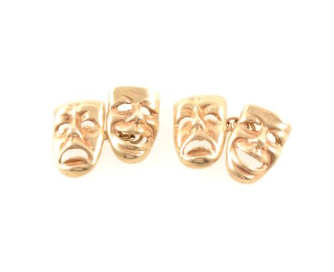 A pair of 9 carat yellow gold cufflinks, the faces depicting "Comedy and Tragedy" masks, hallmarked Birmingham 1994, approxim