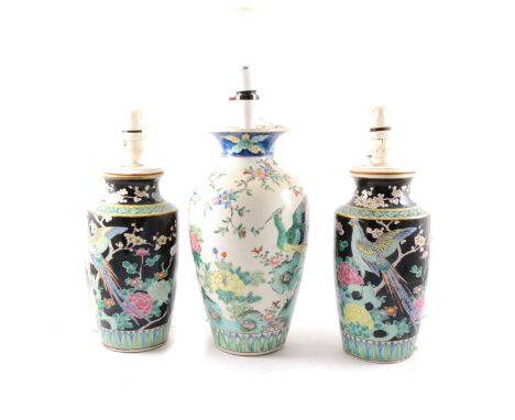 Pair of Chinese Famille Noir shouldered vases, floral decoration, 23cm, serving as lamp bases; crackle glazed lamp base, (3)