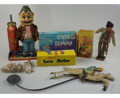 A boxed mechanical model of "Mary had a little Lamb" together with a tinplate battery operated Balloon blower, an articulated