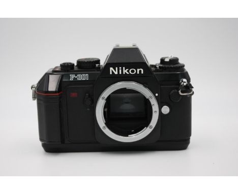 Nikon F-301 SLR Film Camera No. 2748654 (BODY ONLY)  Camera is WORKING &amp; in good condition Tested with batteries &amp; AF