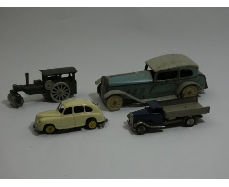 Tinplate clockwork limousine together with a Minic steamroller, truck, and diecast model of a car.