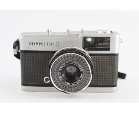 Olympus Trip 35 w/ D. Zuiko 40mm F/2.8 Lens  Vintage condition - signs of age &amp; use Camera winds and fires as should Aper