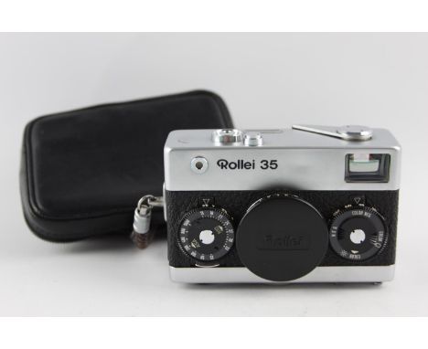 Rollei 35 Film Camera (Silver &amp; Black) Tessar 40mm F/3.5 Lens w/ Lens Cap &amp; Case  This camera is WORKING &amp; in a g