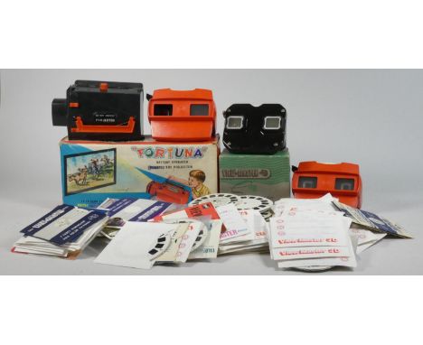 A substantial collection of View Master stereo reels, three View Master stereoscopes and a boxed 'Fortuna' battery operated t