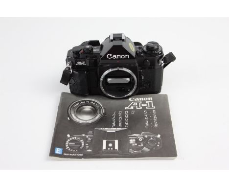 Canon A-1 35mm SLR Film Camera (Body ONLY) All Black Colour-Way w/ Instructions  NOTE: Camera has CANON COUGH &amp; will requ