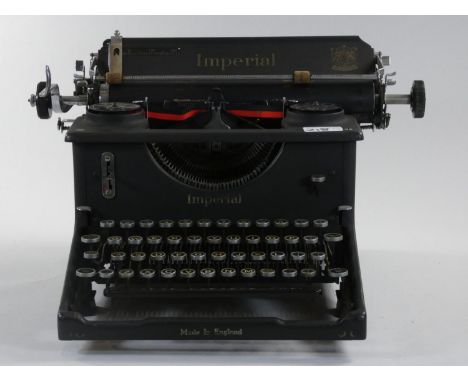 An Imperial Model 50 standard typewriter complete with instruction book, together with another Imperial typewriter. 