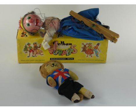 World Cup Willie moveable teddy, together with a boxed Pelam Puppet 