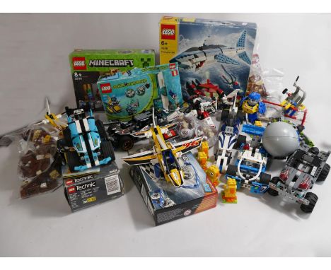A large collection of Lego and technic including- 4506 Shark, 9390 Truck , together with a collection of primarily TOMY Thoma