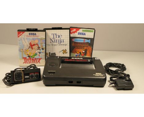 Sega Master System Two Console. Comes with power supply, control pad and TV lead. Along with three games, The Ninja, Asterix,