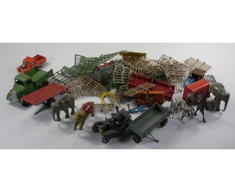 A die-cast model of a farm, together with a collection of plastic and lead animals, along with play worn vehicles including m