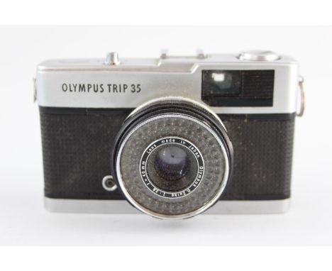 Olympus Trip 35 w/ D. Zuiko 40mm F/2.8 Lens  Camera winds and fires as should Aperture blades are responsive Light meter is N