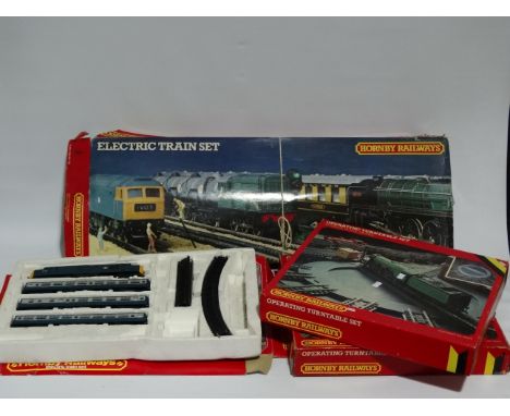 Hornby Railways - 'Operating Turntable Set R410' x 2, another Set R873-9130 (part set) and Set R 825-9140 00-511'.
