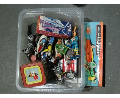 A Met Toy tractor and trailer, boxed - together with a quantity of tin plate toys, including Japanese.