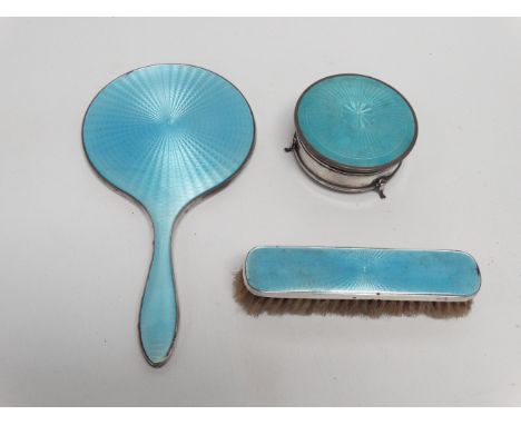 A silver and engine turned enamel dressing table set - Brimingham 1929, comprising hand mirror, brush and circular trinket bo