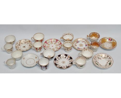 An early 19th century Worcester trio set - with blue floral sprigs and gilt decoration, together with six further 19th centur