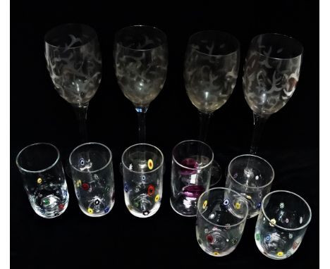 Three clear glass tumblers decorated with coloured canes - possibly Murano, together with three further similar long glasses 