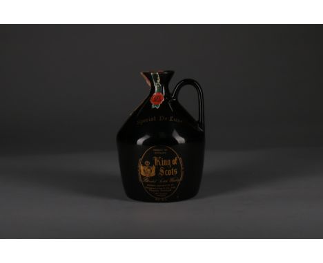 KING OF SCOTS Blended Scotch Whisky Full sized decanter, 43% volume, black ceramic flagon.