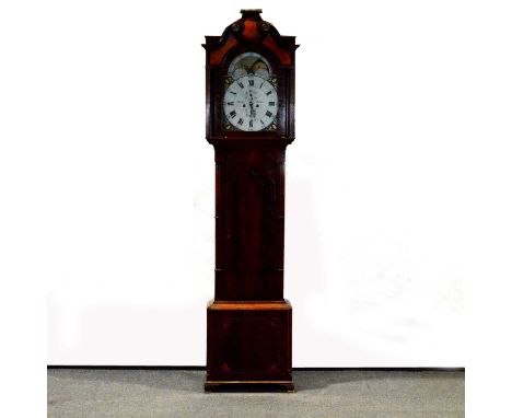 Mahogany longcase clock, the hood with swan neck pediment and fluted columns, trunk with lancet door, and on ogee bracket fee