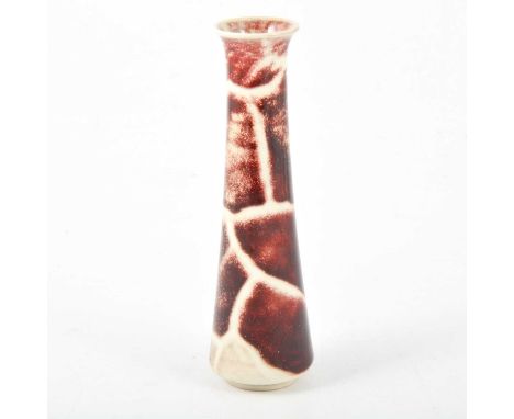 Ruskin Pottery, a tapered high fired vase, 1913, deep red sang de boeuf with veining, stamped 'Ruskin 1913, 20cm.Condition re