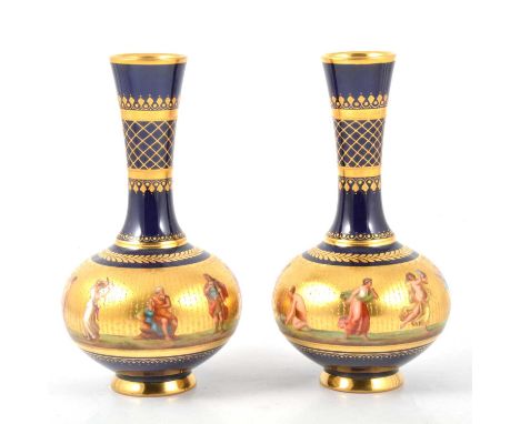 Pair of Vienna porcelain vases, flared collars with gilt trellis pattern, ovoid bodies painted with figures on a gilt ground,