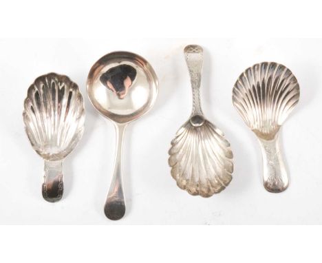 George III silver caddy spoon, JT, Birmingham 1802, shell bowl, engraved handle with initials, 7cm, and three other early 19t